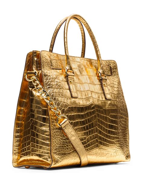 gold limited edition michael kors purse|michael kors large gold tote.